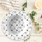 Personalized White Stylized Monogram Bowl Set features customized black initials set in a repeating pattern accented with a stylish motif for an all-over, unique design.
