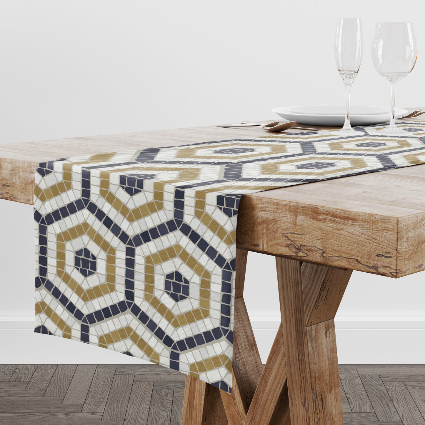 Mosaic tile table runner in black, gold and cream in a hexagon pattern on a wood dining table