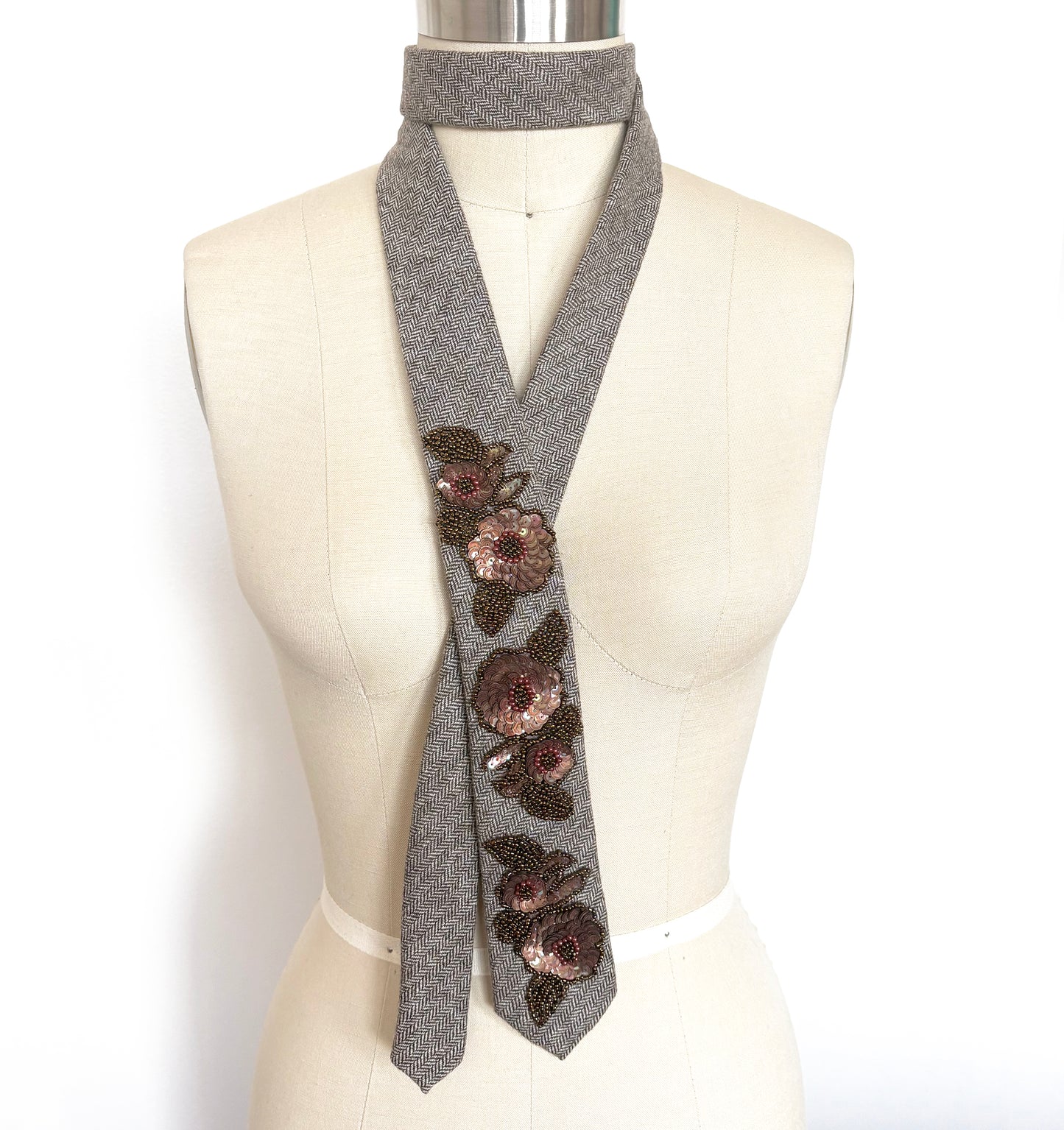 Embellished Necktie - brown herringbone tweed tie with bronze sequin appliques on mannequin