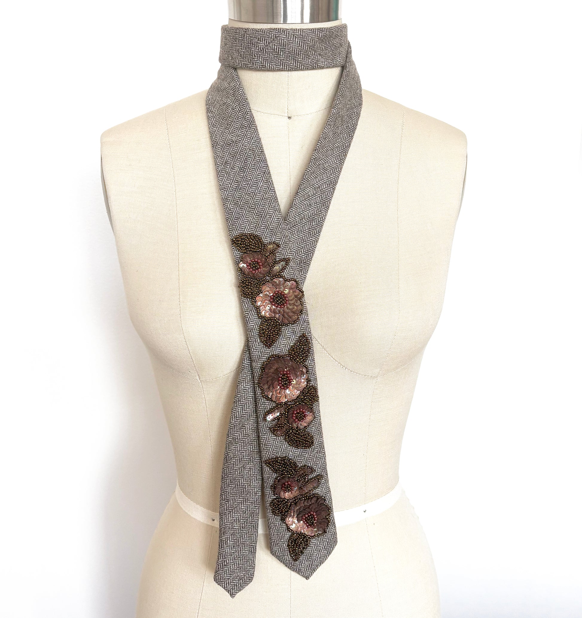 Embellished Necktie - brown herringbone tweed tie with bronze sequin appliques on mannequin
