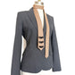 Camel tan necktie embellished with black decorative trim shown on mannequin with grey blazer