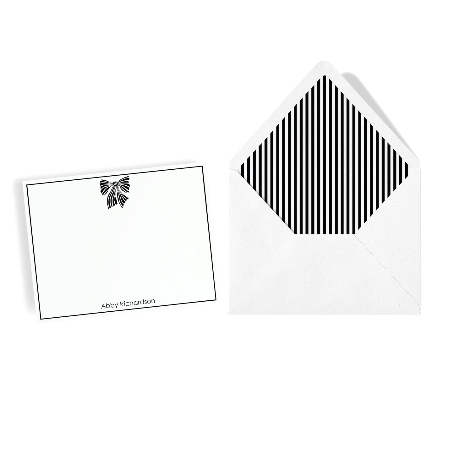 Fashion black and white bow motif notecard set with border and custom name and coordinating stripe lined envelope