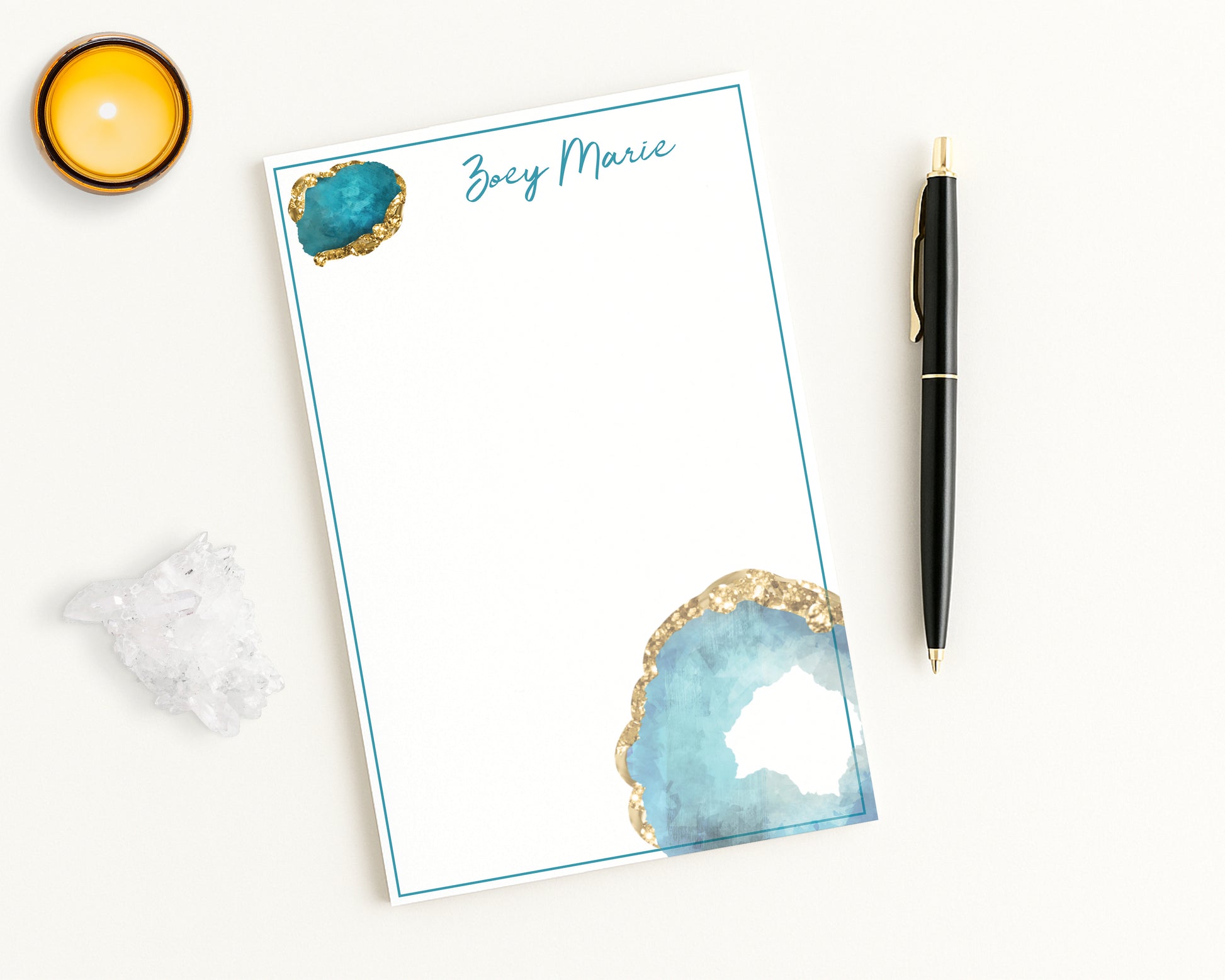 Personalized Notepad with geode jewel design and pen on a white background