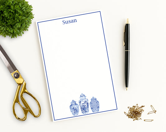 Writing notepad with ginger jar  motifs and custom name shown with desk accessories