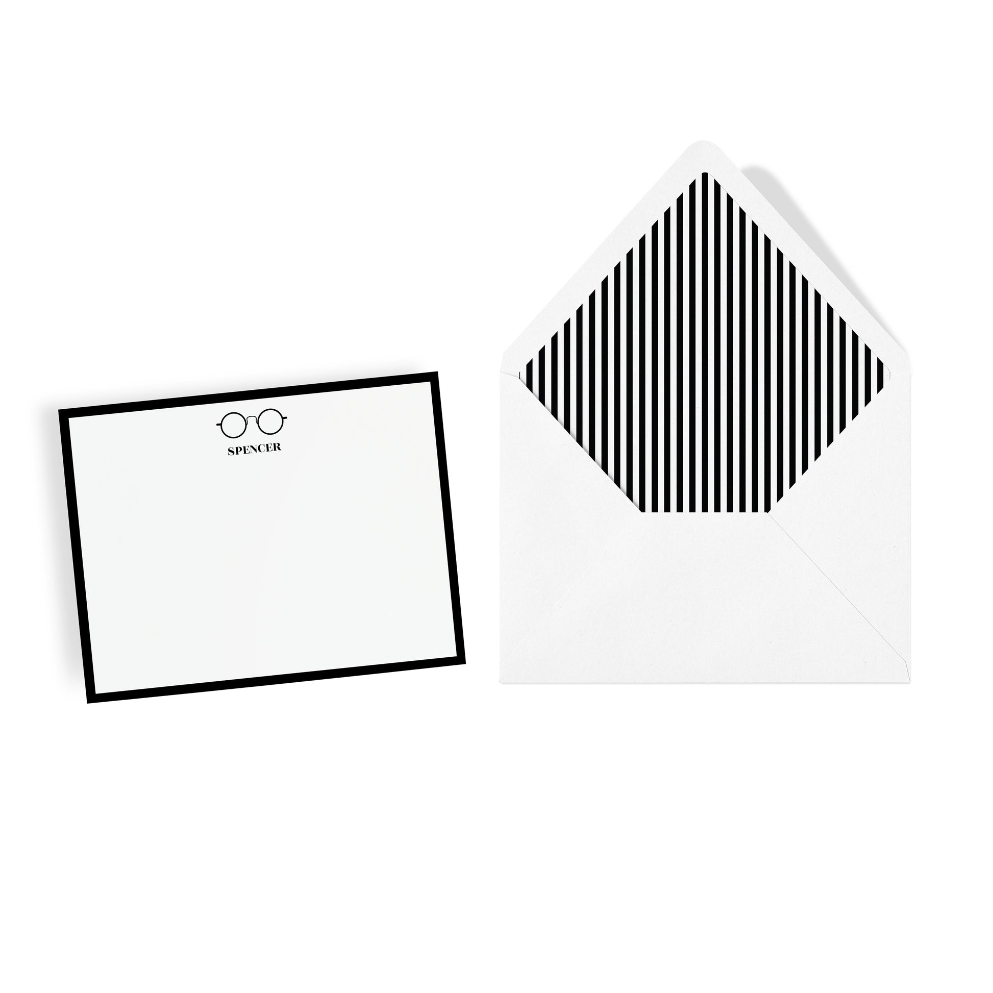 Custom monogram stationery with wire eyeglasses motif and and striped envelope on a white background