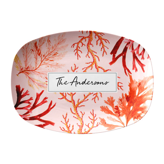 Decorative serving platter with red and pink coral pattern and custom text on a white background