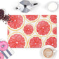Colorful pink grapefruit slices are printed on this unique kitchen counter mat. Reverses to nonskid rubber back.