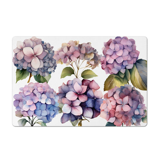 Pink and purple hydrangeas are printed on this pretty pet placemat for your dog or cat.