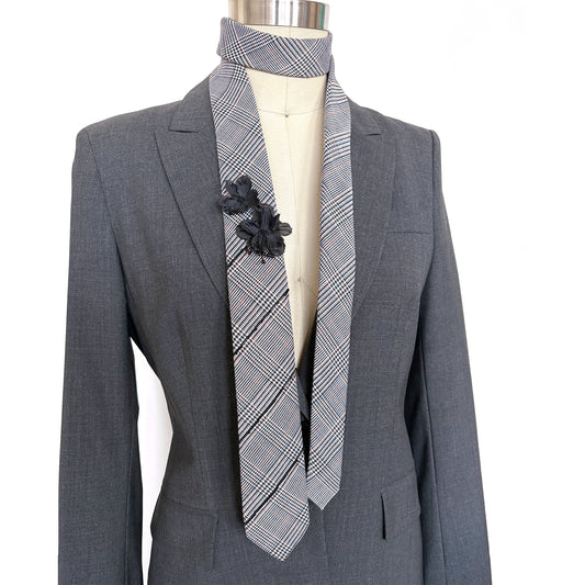 Black & White Plaid Skinny Necktie upcycled with beads embroidery and flowers with French Knots on mannequin with grey blazer.