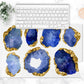 Pretty blue and gold oversized gemstones are printed on this unique desk pad. May also be used as a counter trivet or bar cart mat.