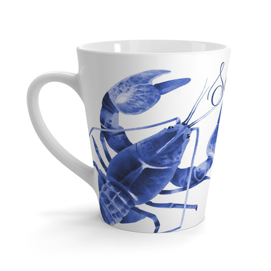 White ceramic coffee mug with a blue lobster design on a white background