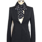 Black blazer with a black and white polka dot bow scarf on a mannequin against a white background