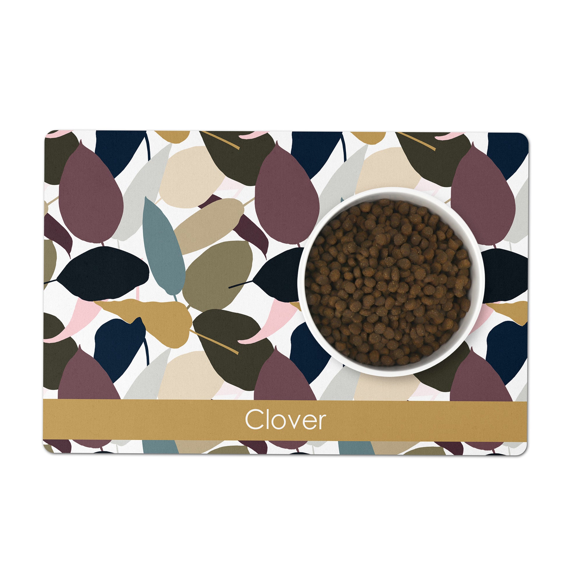 Colorful modern leaf print pet feeding mat personalized for your dog or cat with any name or word.