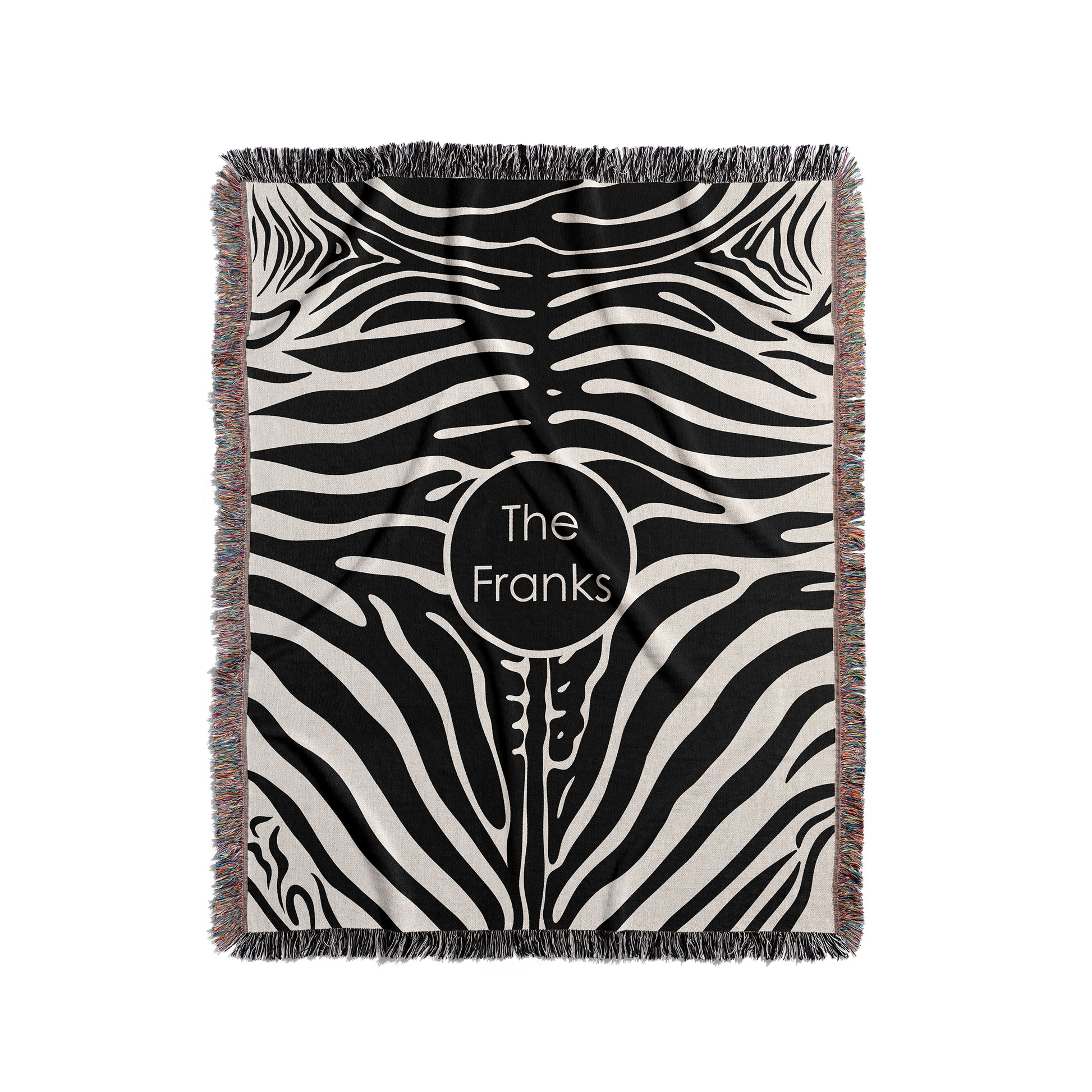 Personalized woven blanket with a black and cream zebra stripes pattern.