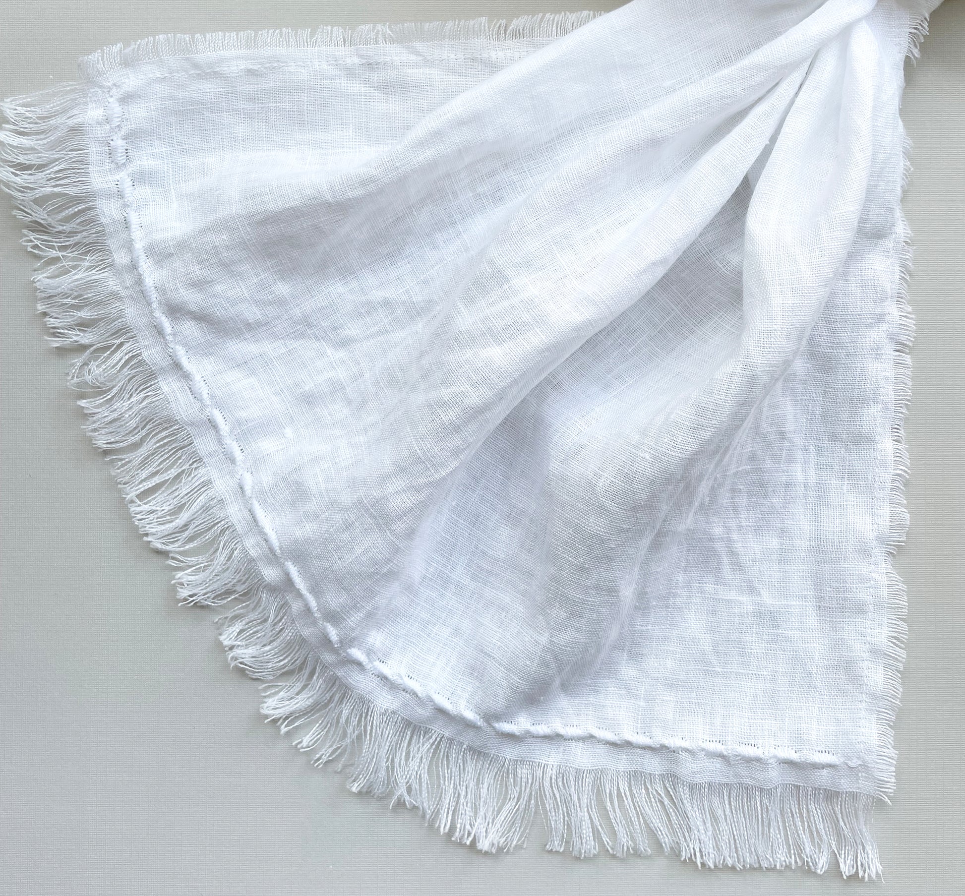 White Fringed Linen Scarf with Embroidered Trims