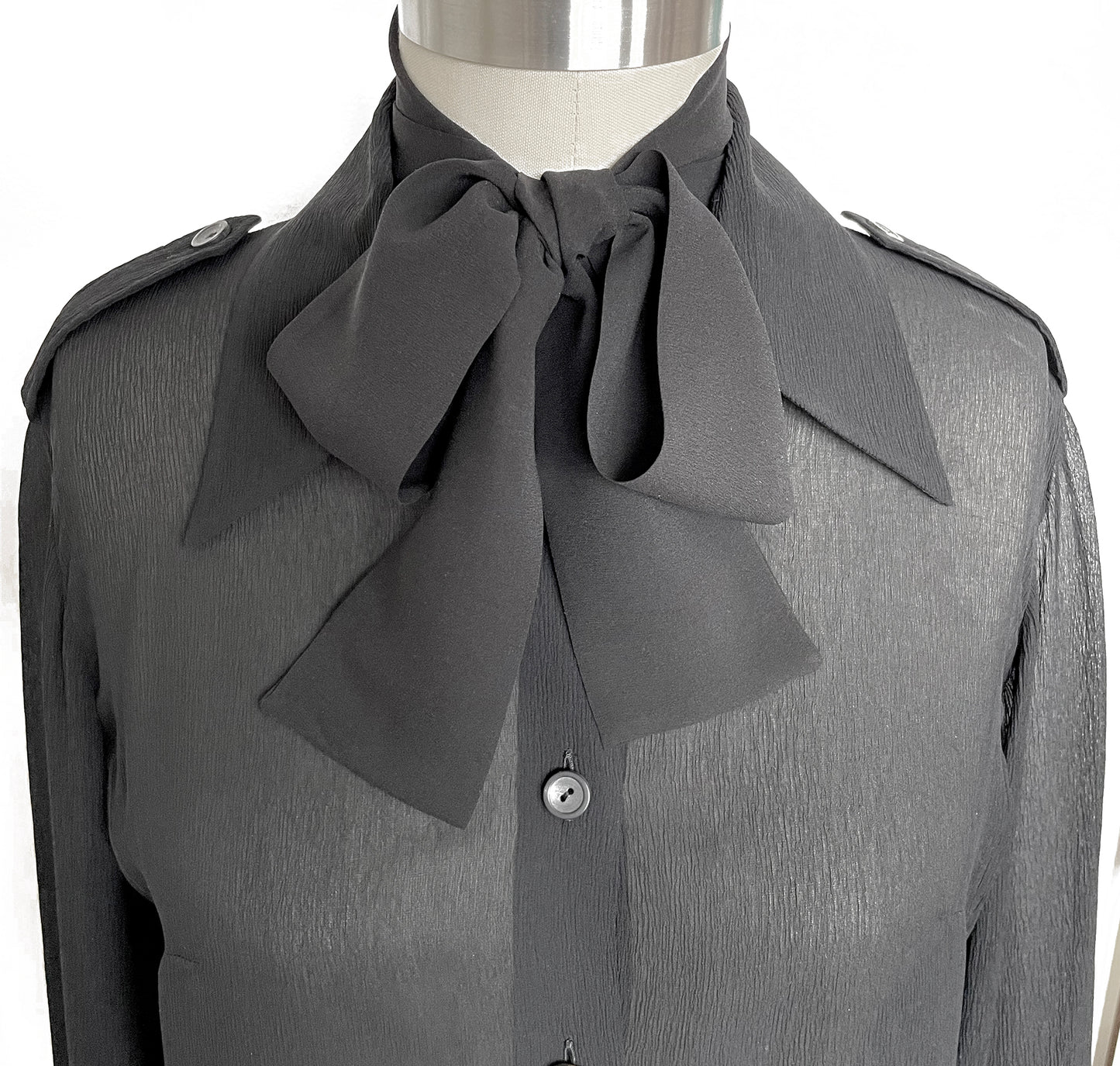 Black Silk Skinny Neck Scarf tied in a Bow shown on blouse