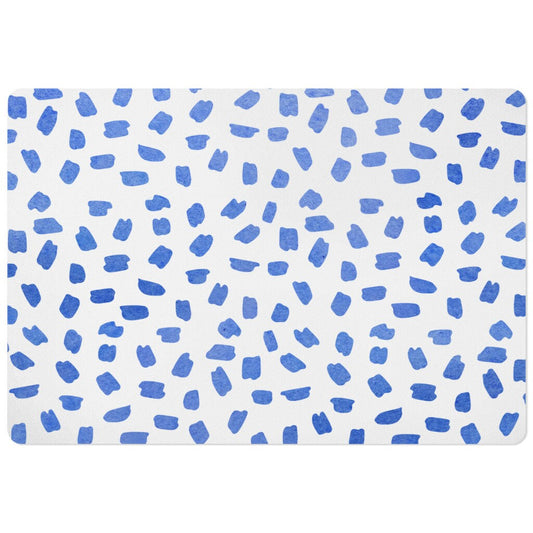Pet Mat with blue brush strokes on white.