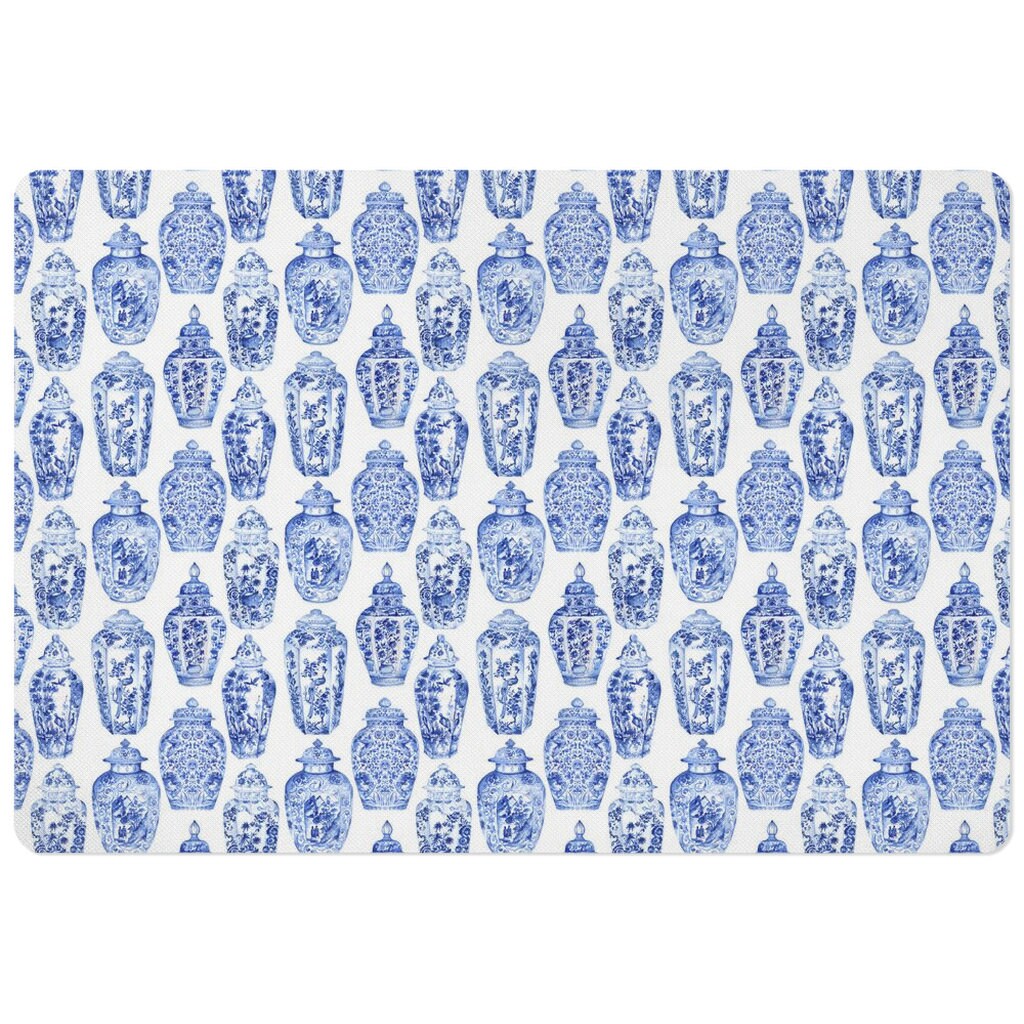 Mat for pet food bowls with blue and white chinoiserie ginger jars print.