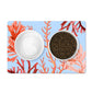 Nautical pet food mat with sea coral print blue and orange.