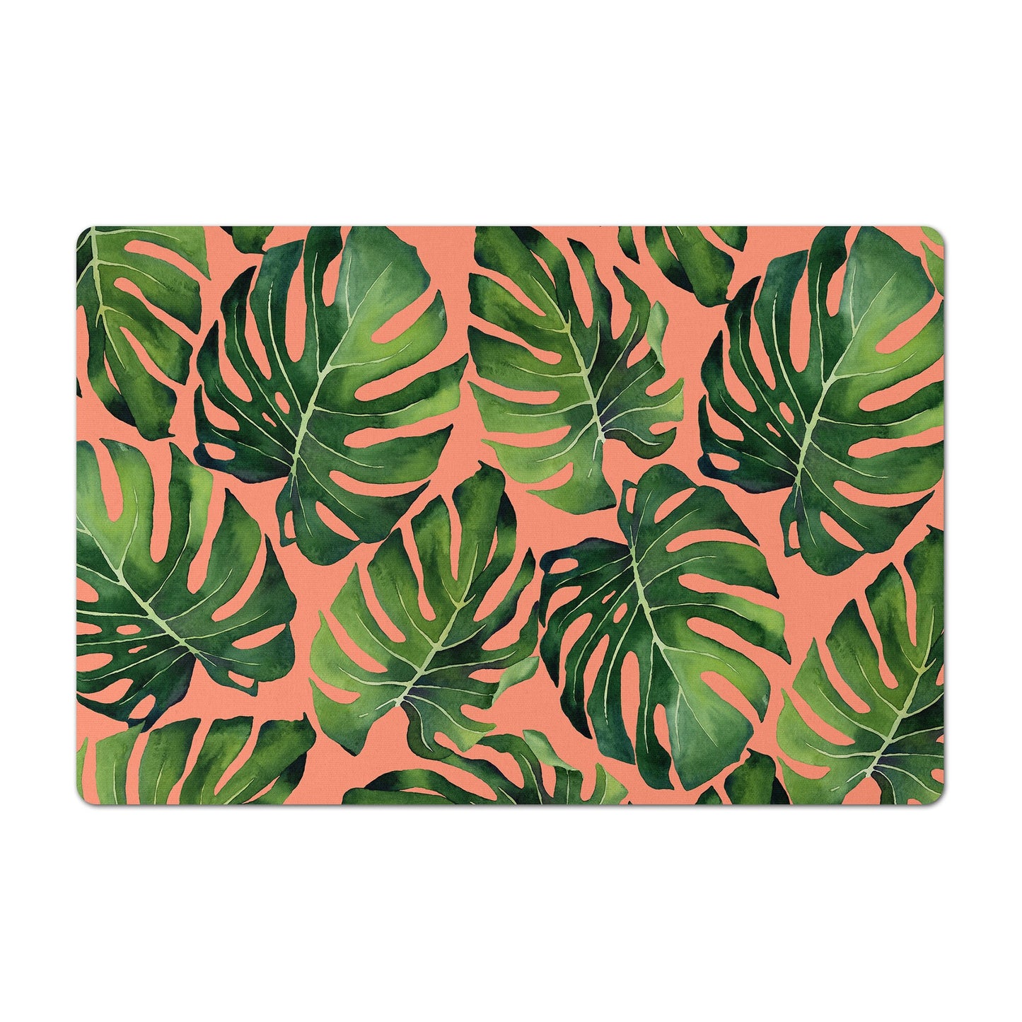 Pet food mat or pet door mat with green monstera palm leaf print on coral.
