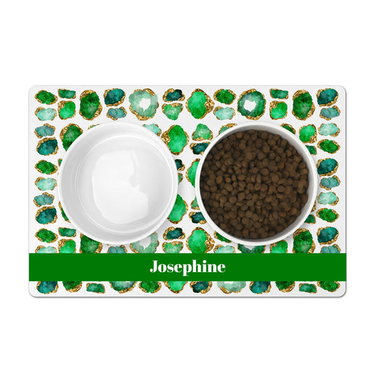 Personalized mat for food bowls for  your dog or cat has gorgeous emerald and gold gemstones print. Add any name or word.