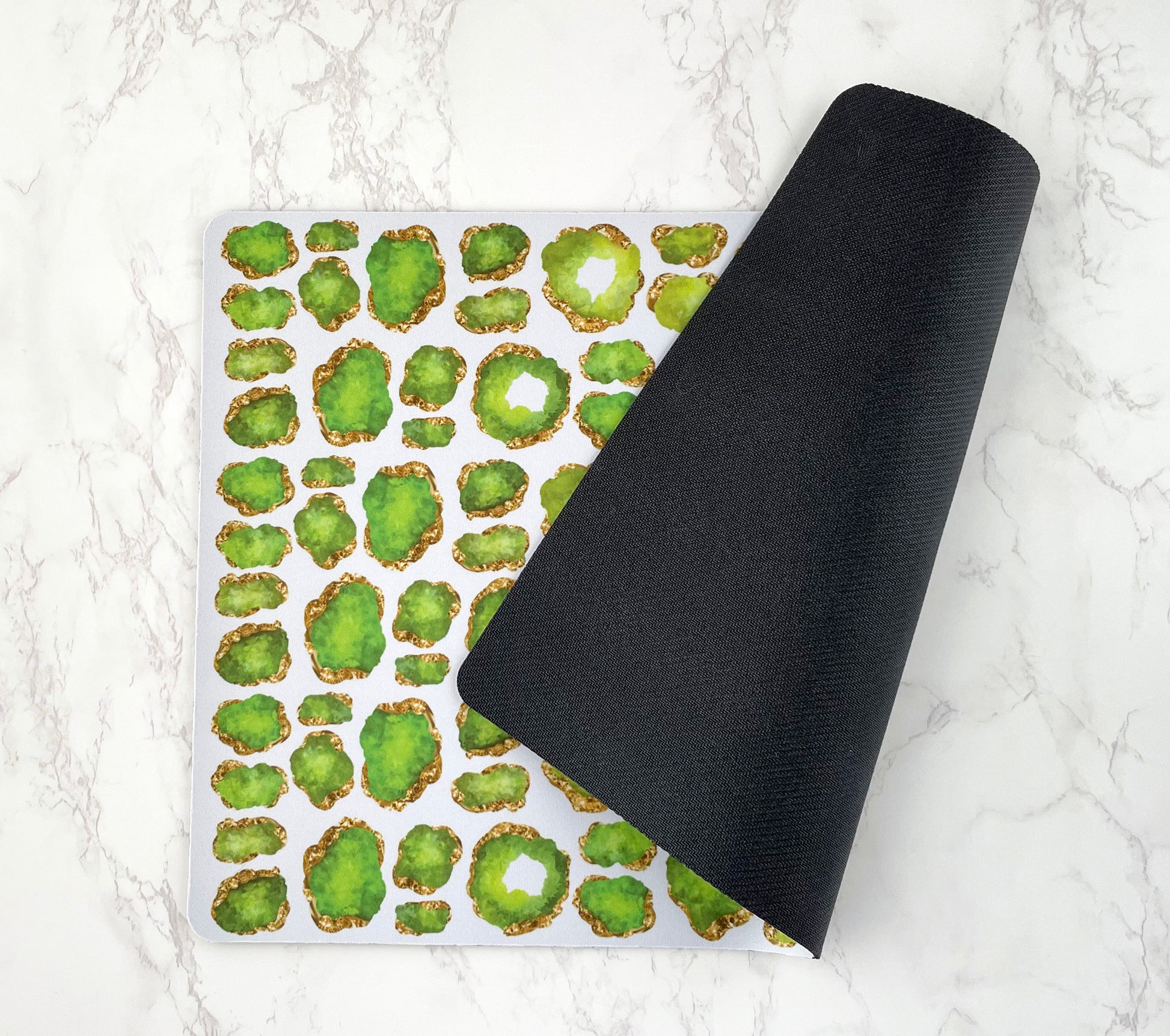Pet Placemat has gemstone print in green & gold with black rubber backing.