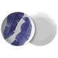 Tropical banana leaves print plastic dinner plates in blue and white.