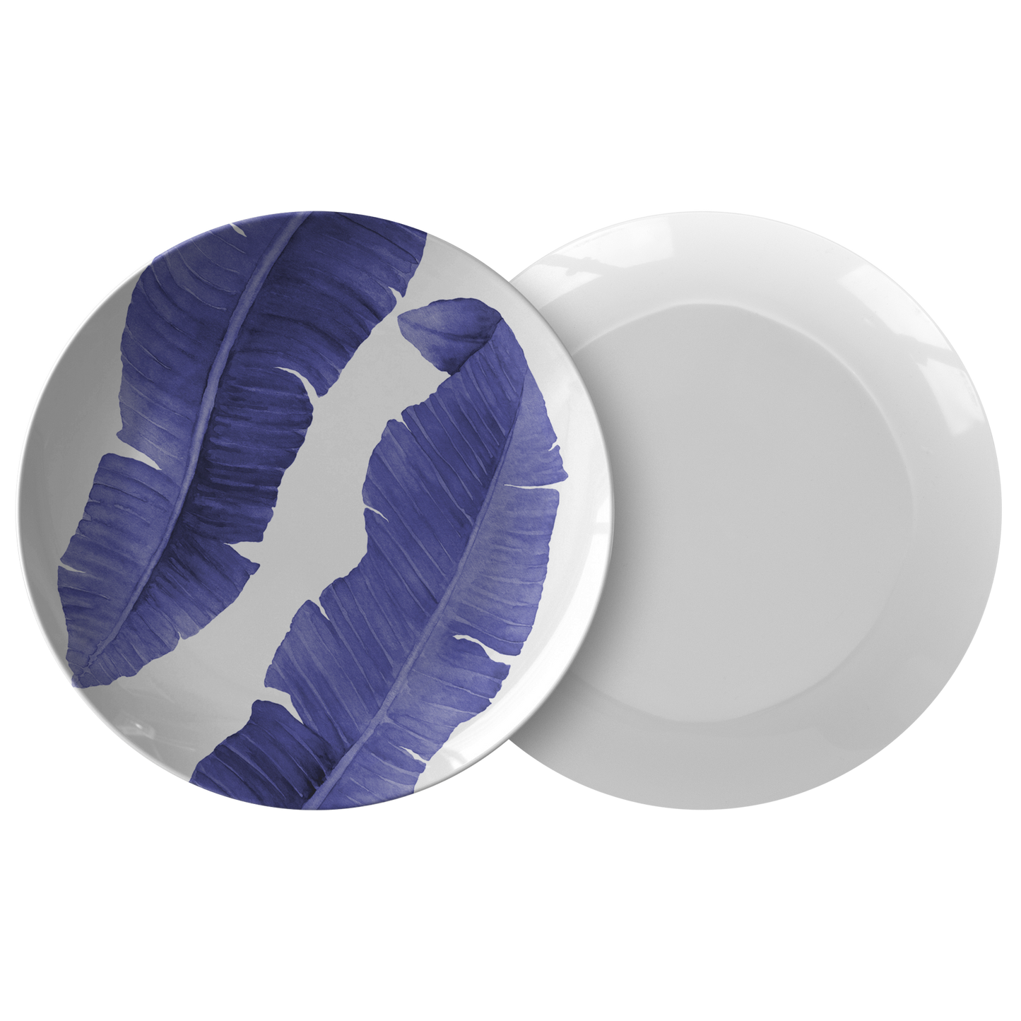 Tropical banana leaves print plastic dinner plates in blue and white.